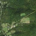Barn fire spreads toward woods on Monks Road