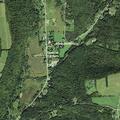 Vehicle reported into trees near Hogback Road