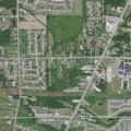 77-year-old male reports abdominal pain near Flat Rock