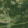 Man falls from tree stand near power line trail in woods