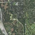 Smoldering tree reported on trail near Forest Way Grove