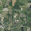 Officers check on juveniles sitting on dirt road