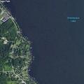 Person unresponsive and receiving CPR at lakeside cabin