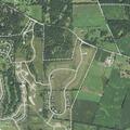 Person lying on ground near bicycle near Woodstock