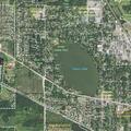 Person suffering from back pain near Glen Street in Grayslake
