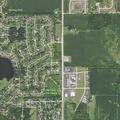 Male falls near countryside gas station car area