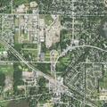 Person experiencing back pain near Alpine Drive