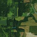 Power lines down on vehicle near Machias residence