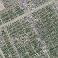 Man kicking door at Highland Street apartment