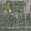 Illegal dumping from truck at vacant lot