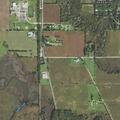 Pickup truck leaves road and enters ditch near site