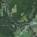 Woman experiencing chest pain and breathing trouble near State Highway 12