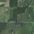 Downed power lines and broken pole block roadway