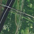 Flooded culvert washes out roadway and threatens nearby basement