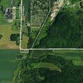 Disabled car stopped on railroad tracks