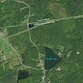 Vehicle incident with road closure on Packard Road