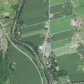 Caller located in back of cornfield at scene