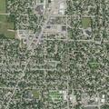 Officer checks blue motorcycle at Milton Avenue home