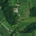 Suspicious vehicle backed up to barn after death at residence