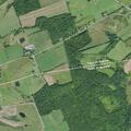 Elderly woman found fallen in a field near Slate Hill Road