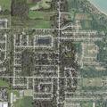 Woman with severe back pain and numbness in Racine home