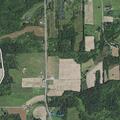 Partially down utility pole blocking Gray Road