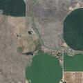Brush fire reported under power pole