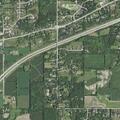 Woman experiencing chest and shoulder pain near Artesian Avenue