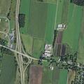 Kitten reported in roadway near teal Honda