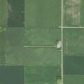 Broken down grain cart checked on rural roadway