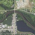 Two-vehicle crash injures three at Grand River and Beltline