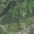 Vehicle stuck after hitting gravel pile in roadway