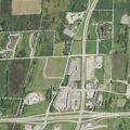 Pregnant woman in underwear with baby near Dodge van out of gas
