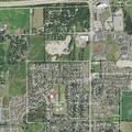 Person experiencing abdominal pain at Cottage Grove apartment