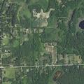 Woman bleeding from arm injury near Columbiaville