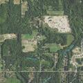 Cooking fire contained outside home on 14 Mile Road
