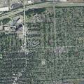 Officers search yards on North Park Drive