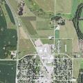 Second combine fire spreading into nearby field