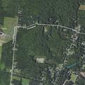 Suspicious man searching yards and porches