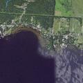 Overturned sailboat with two people rescued