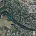 Person experiencing abdominal pain in Garden City