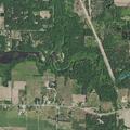 Elderly woman with stomach pain in Hart Township