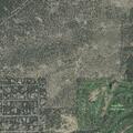 Controlled burn of large debris pile in dirt field
