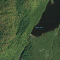 Woman suffering from extreme pain at campground site