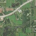 Trees down on wires causing fire near river