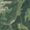 Search for woman after car stuck in woods