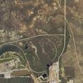 Wildfire burning near Coal Creek oil well area