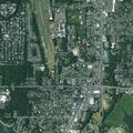 Person suffering from headache near Laurel Street