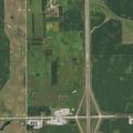 Truck driver at crossroads has foreign object in eye