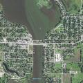Naked man reported in vehicle trunk near E Main St
